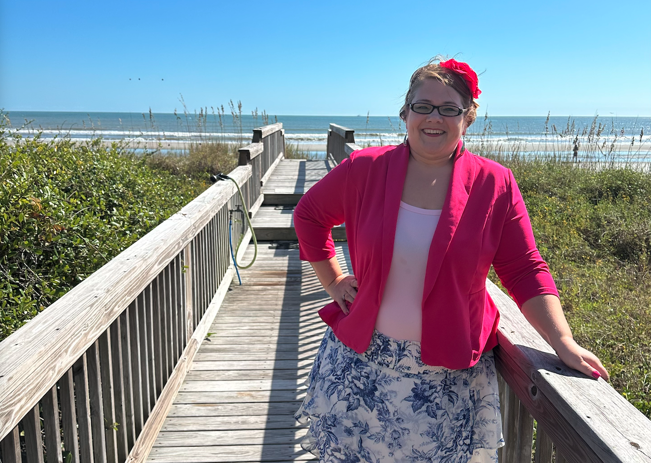 Katie Hornor on boardwalk to beach